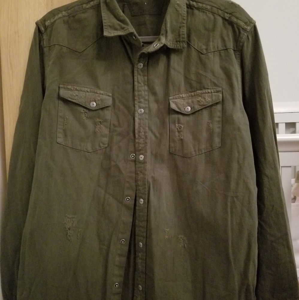 Snap button down shirt.